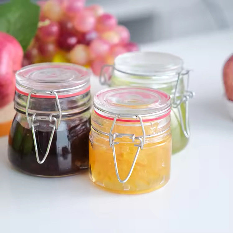 Popular Wholesale 100ml 180ml 280ml Food Grade Round Honey Glass Jar With Clip Cover
